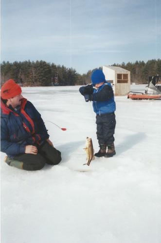 Ice fishing with his dad